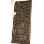 A late19th/early 20th century carved oak panel. (Dimensions: Height 27cm, width 63cm)(Height 27cm,