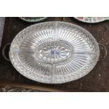 A silver plated oval tray, with twin handles and glass inserts. (Dimensions: Height 4cm, width 35cm,