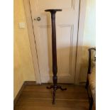 A 19th century mahogany torchere. (Dimensions: Height 159cm)(Height 159cm)