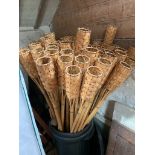 A large collection of bamboo flare holders with their phoenix bamboo flare fuel containers and their