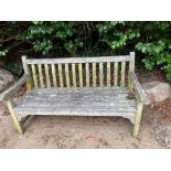 A teak garden bench.