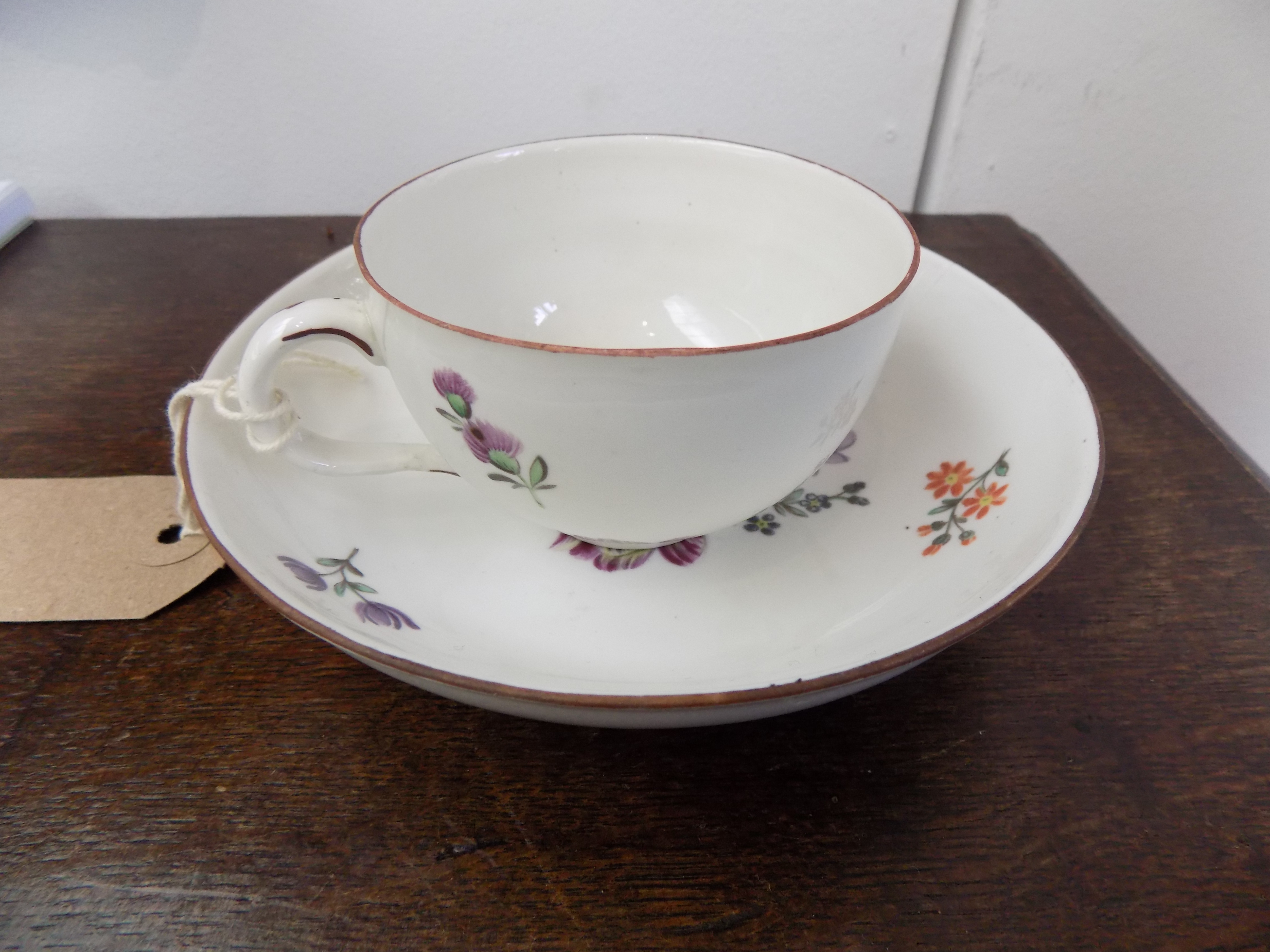 An 18th century Frankenthal teacup and saucer painted with floral sprays.Condition report: See - Image 8 of 11