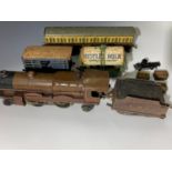 Hornby 0-Gauge comprising Royal Scot locomotive and three items of rolling stock including Nestle