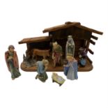 A collection of ten Goebel nativity figures, together with wooden stable (11). (Dimensions: