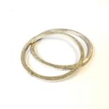 Two heavy sterling silver bangles by John (Red) Simpson, 117gm. (Qty: 2)