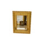 A gilt framed mirrored wall sconce, 20th century. (Dimensions: Height 69cm, width 53cm.)(Height