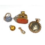 A 9ct gold blue stone set ring, a large gilt seal, a 15 ct gold stud a gold clip and one other