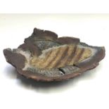 A Jim Robison studio pottery stoneware footed bowl, incised 'Jim Robison 93-15' to base, width 48.