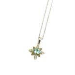 A 14ct gold diamond and aquamarine pendant by Le Vian. Cased