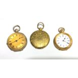A gold cased fob watch, one other fob watch and a gilt locket.