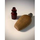 A small Victorian flask covered with basket work and with threaded pewter lid, together with a
