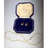 A child's graduated pearl necklace with 9ct gold barrel clasp signed 'Ciro' and a pair of