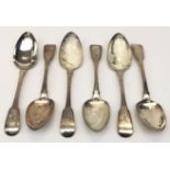 A set of three George III silver fiddle pattern tablespoons by John Lambe together with another