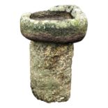 A granite bird bath. (Dimensions: Height 65cm.)(Height 65cm.)