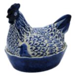 A Bridgewater blue and white pottery hen on nest tureen. (Dimensions: Height 22cm, width 23cm.)(