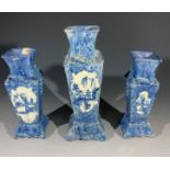 A very rare set of three early Longton Hall vases, circa 1747, moulded with squirrel and vine on a