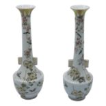 A pair of Japanese porcelain vases, early 20th century, with red character marks to underside. (