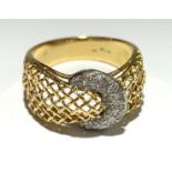 An 18ct gold,platinum and diamond ring, size P. (Qty: 1)