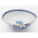 A Chinese blue and white porcelain bowl, Qianlong period, decorated with birds on flowering