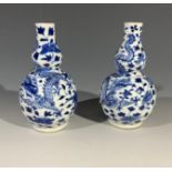 A pair of Chinese blue and white double gourd vases, late 19th century, height 14cm.Condition