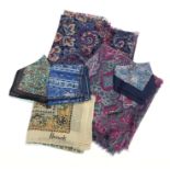 Two Liberty printed shawls, a collection of Liberty squares and a Harrods scarf.