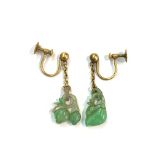 Two Chinese jade earrings each carved as fruit and with 9ct gold screw fittings.