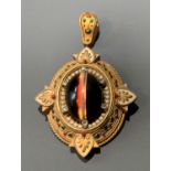 A good Revivalist brooch in the manner of Giuliano, a central banded agate within six diamonds and