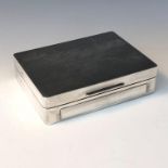 An engine turned silver cigarette box by Garrard & Co Ltd. (Qty: 1)