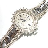 A ladies 18ct white gold cased Le Monde (Swiss) cocktail watch with diamond set bezel on 18ct
