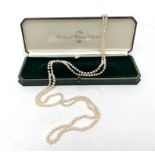 A long rope of pearls (each approximately 5.49mm) from the Harrod's Duchess of Windsor collection.