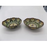 A pair of Chinese cloisonne candle trays, late 19th century. (Dimensions: Diameter 11cm.)(Diameter
