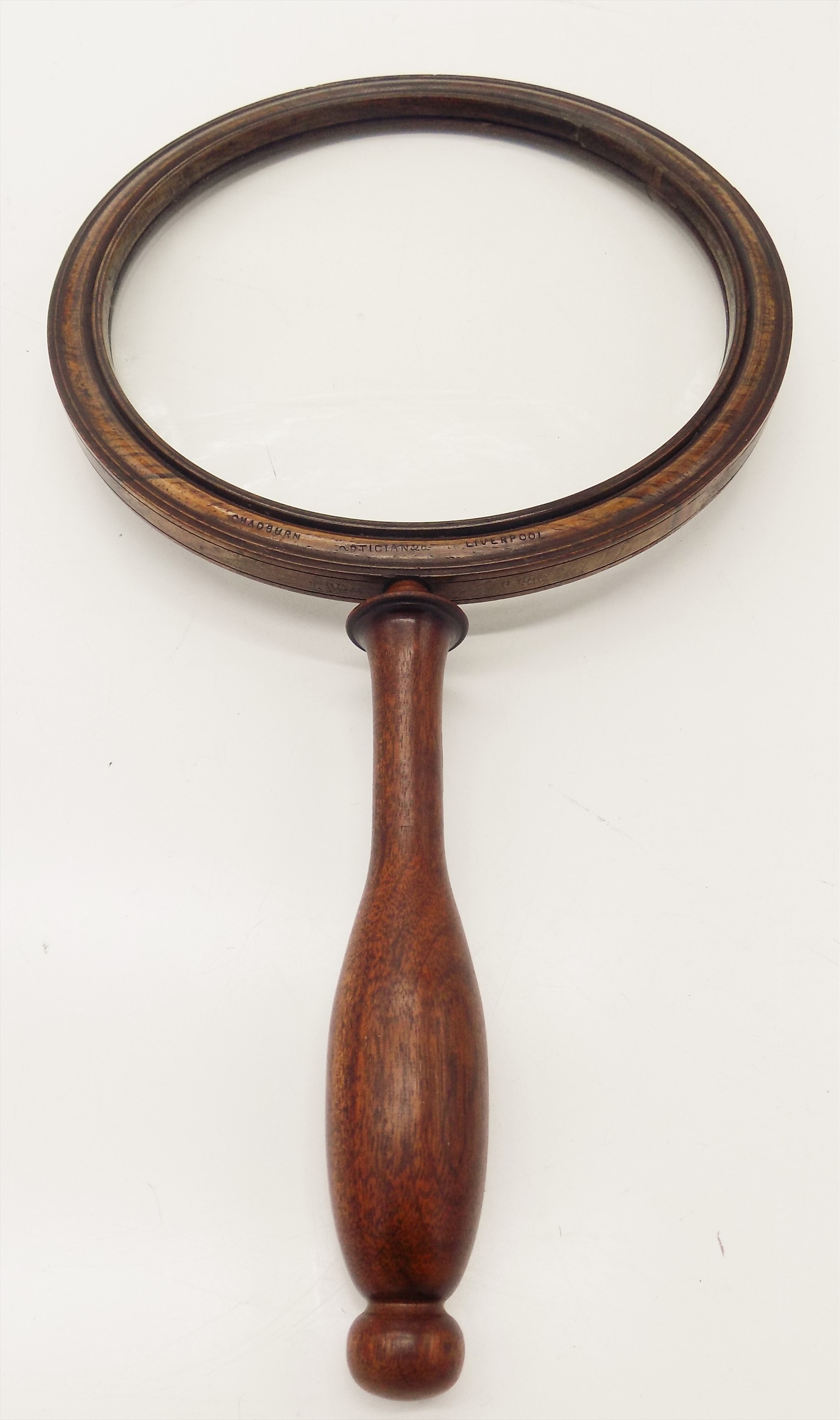 A rosewood gallery glass, signed Chadburn Optician, Liverpool. (Dimensions: Height 43.5cm