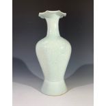 A celadon baluster vase, 20th century, possibly Korean, signed to the underside with blue