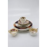 A set of five Davenport stone china dinner plates, painted with an Imari pattern, 26cm diameter,