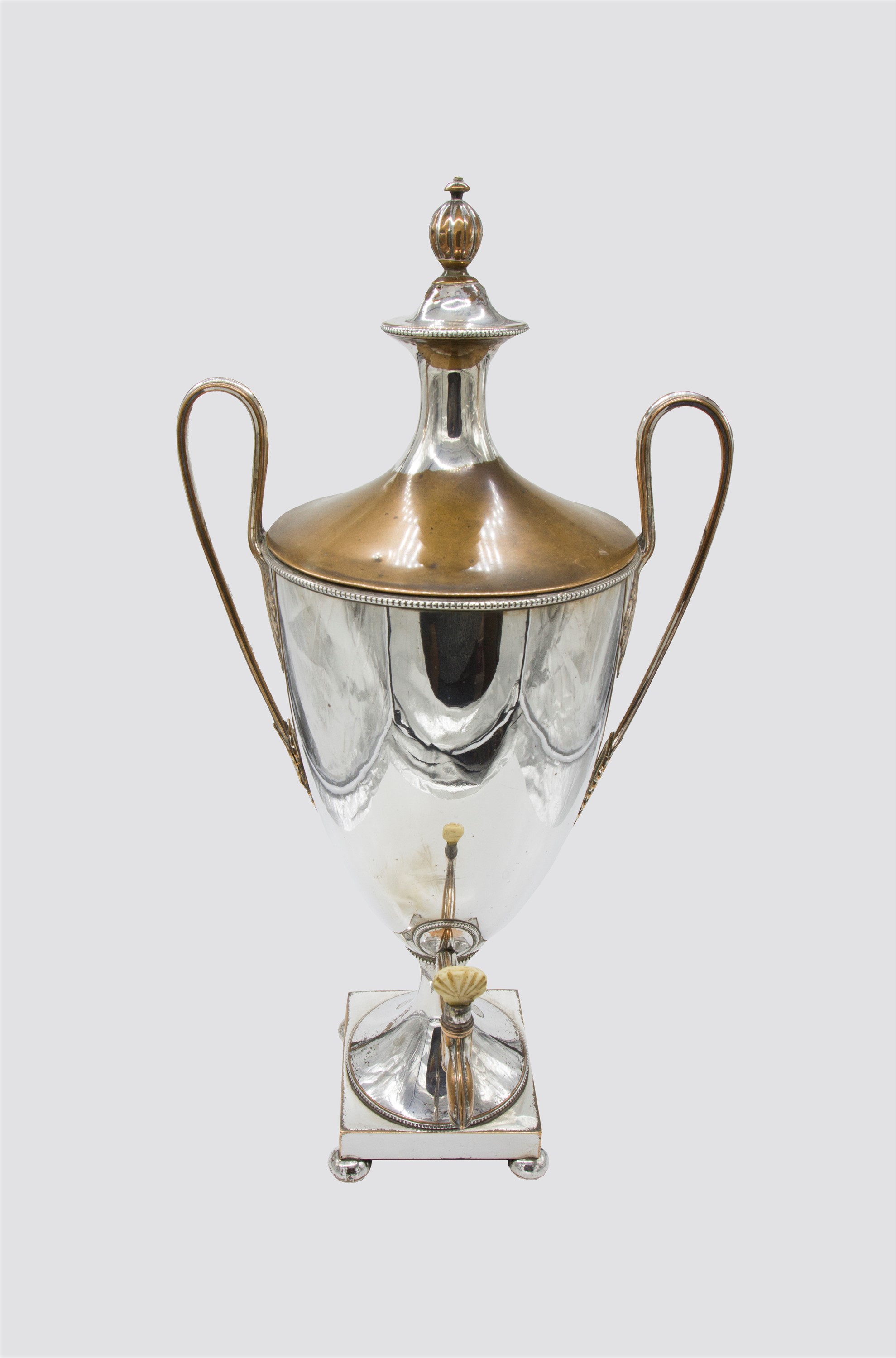 A George III Adam period silver plated tea urn. (Dimensions: Height 59cm.)(Height 59cm.)