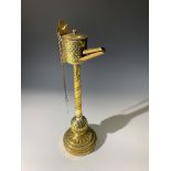 A brass whale oil lamp, possibly Dutch. (Dimensions: Height 43cm.) (Qty: 1)(Height 43cm.)