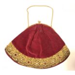 Fine evening clutch purse of deep plum velvet bordered by a 4cm wide band of richly embroidered