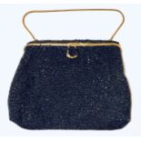Fine evening clutch purse, with all over iridescent blue beading and gilt metal frame and clasp.