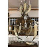 An Italian contemporary lamorack design glass and horn hanging chandelier, with ten branches. (