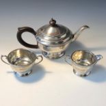 A bachelor's 1930's three piece silver tea service by Marson & Jones, 13oz.