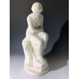 A Minton parian figure, 'Solitude' after J. Lawlor, modelled as a seated female nude with a stork