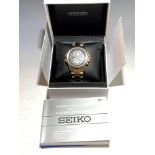 A Seiko analogue quartz solar chronograph gentlemans wristwatch, with original box and paperwork.