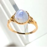 A high purity gold ring set a moonstone.