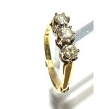 An 18ct gold ring set 3 diamonds