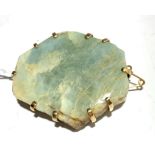Gold mounted jade brooch