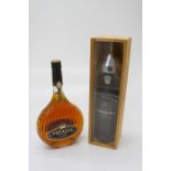 A bottle of Fonseca Guimaraens 1986 vintage port, 75cl (boxed) together with a bottle of Janneau
