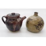 A St.Ives studio pottery teapot with tenmoku glaze, together with a studio pottery bottle vase