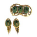 A pair of Victorian gold mounted scarab earrings (lacking hooks) and a gilt brooch set with