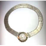 A coin belt, made from 1/4 real coins, the buckle inscribed 'Libertad 15 Setiembre de 1821',