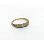 An 18ct five stone diamond ring, 2.1g.